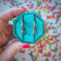 Gold Huggies with September Birthstone Charm