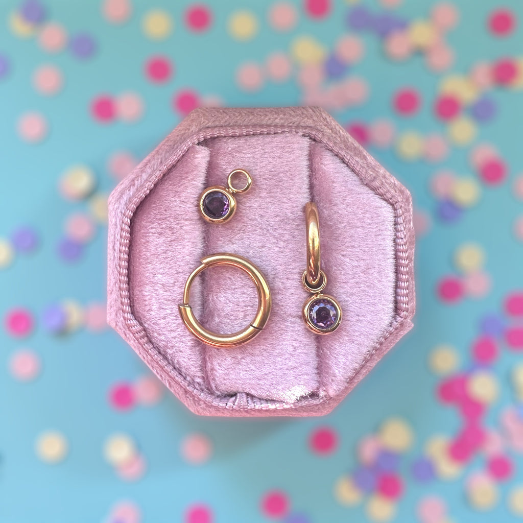 Gold Huggies with February Birthstone Charm
