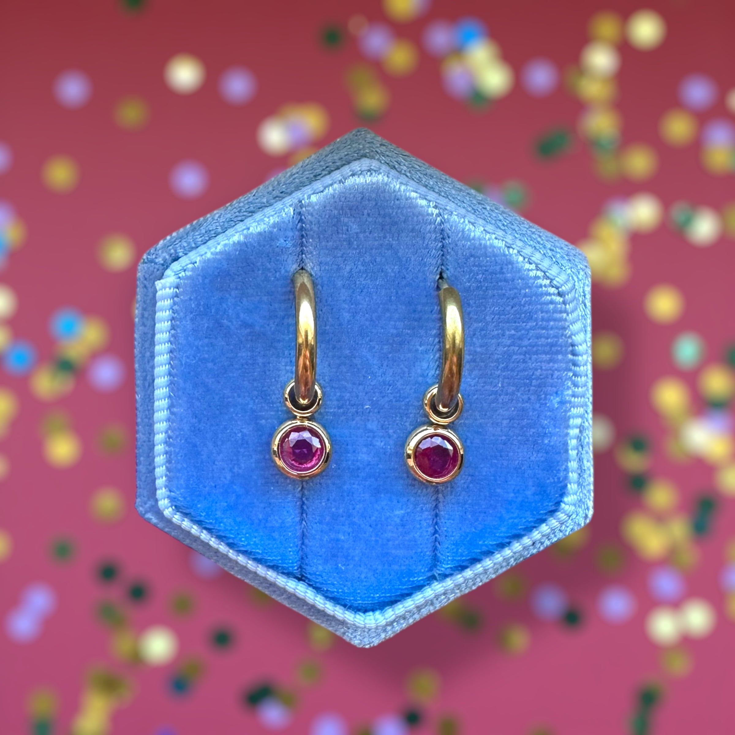 Gold Huggies with July Birthstone Charm